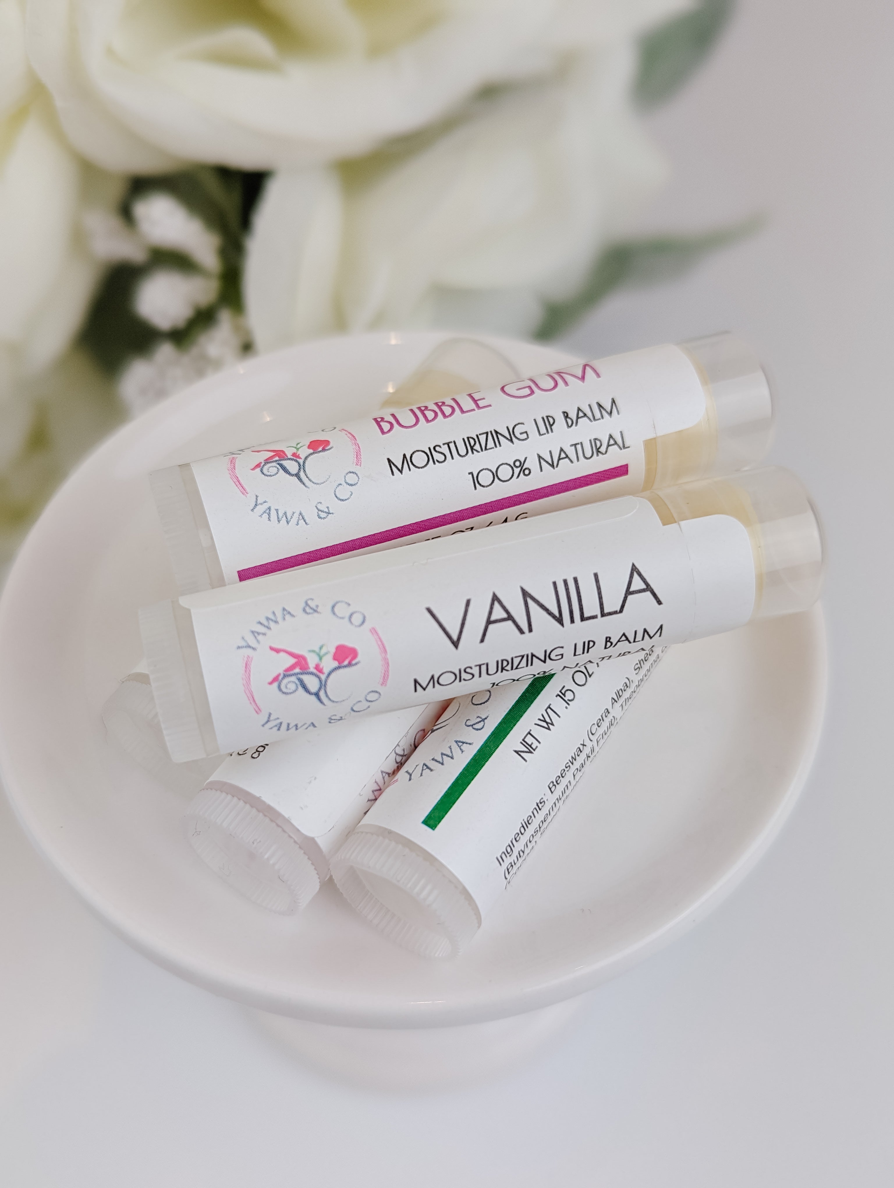 Moisturizing Lip Balm in a compact tube, enriched with natural ingredients to provide long-lasting hydration and a subtle sheen for soft, supple lips.